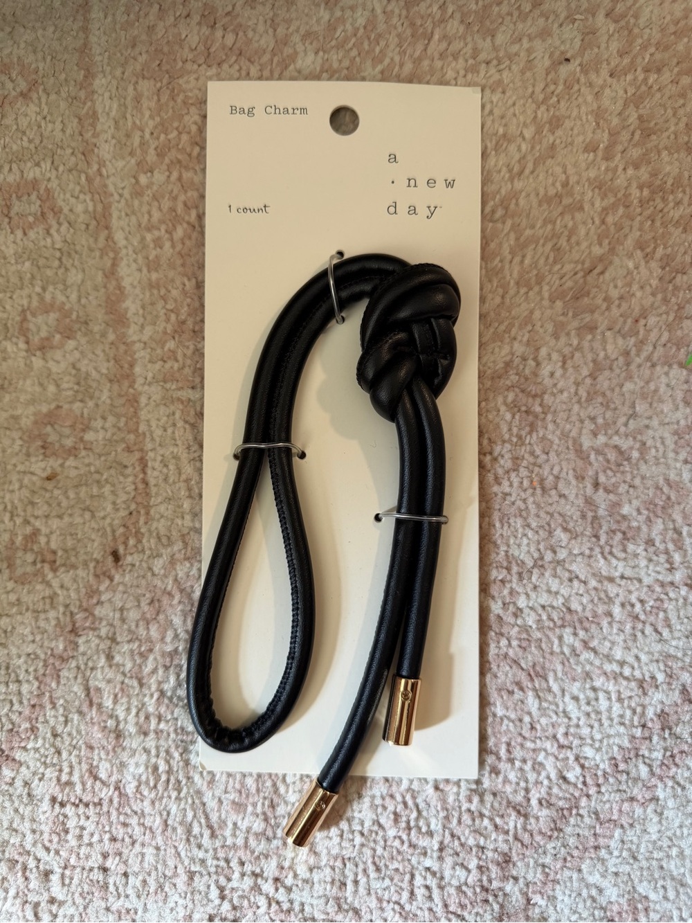 a new day Black Knot Bag Charm with Gold-tone Tips
